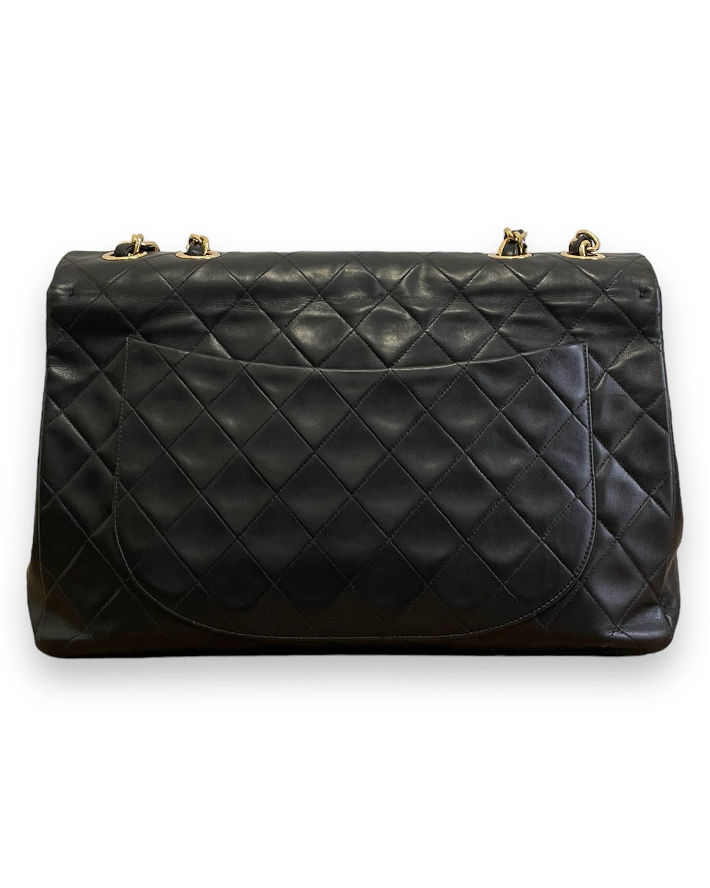 Sac Chanel Timeless Maxi Jumbo en cuir matelassé noir vintage.