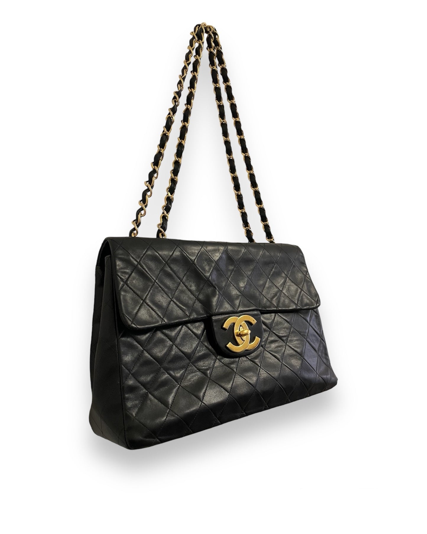 Sac Chanel Timeless Maxi Jumbo en cuir matelassé noir vintage.
