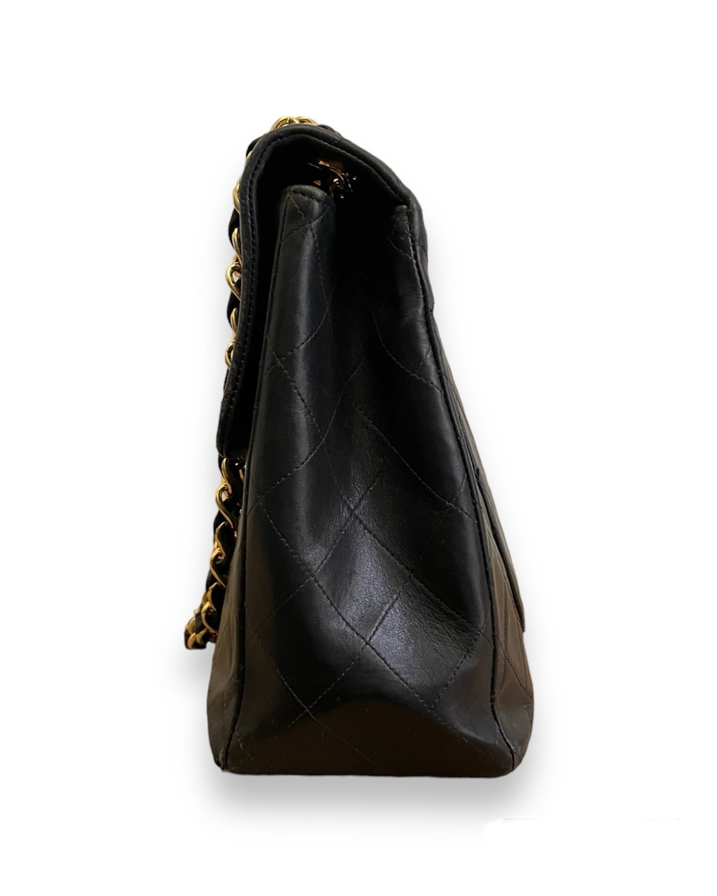 Sac Chanel Timeless Maxi Jumbo en cuir matelassé noir vintage.