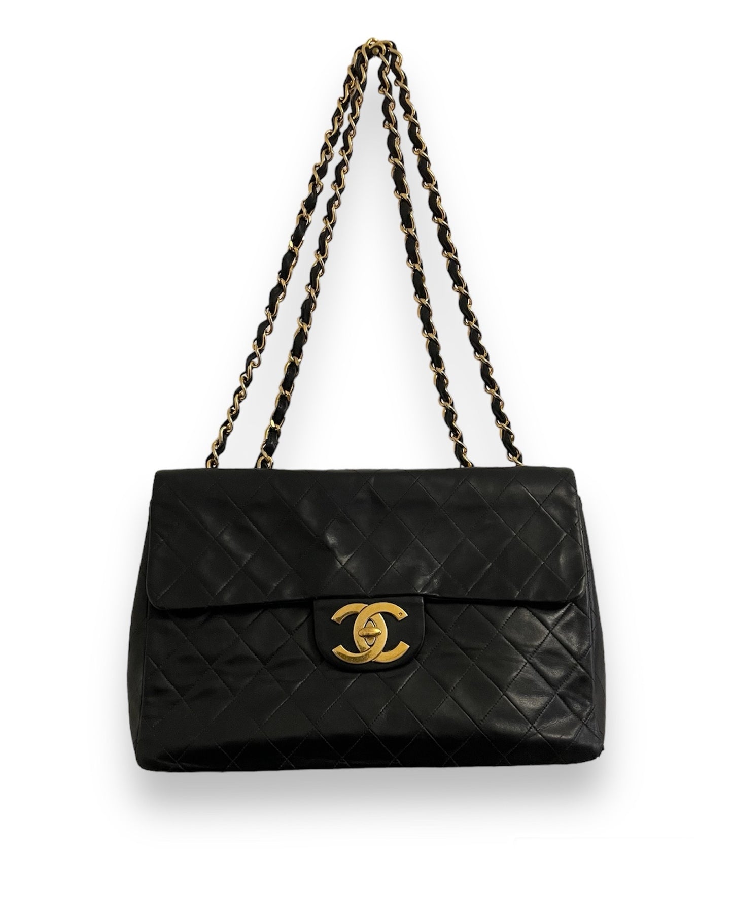 Sac Chanel Timeless Maxi Jumbo en cuir matelassé noir vintage.