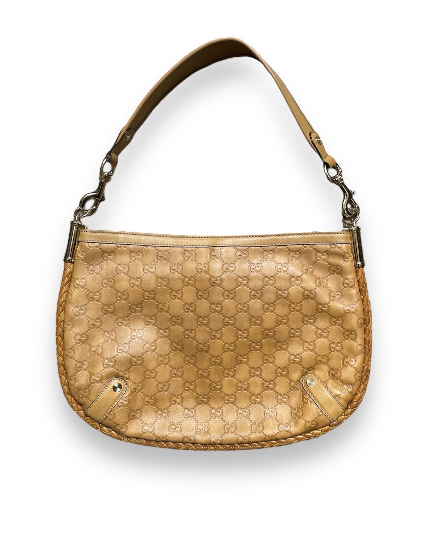 Sac Gucci vintage en cuir camel détail GG doré.
