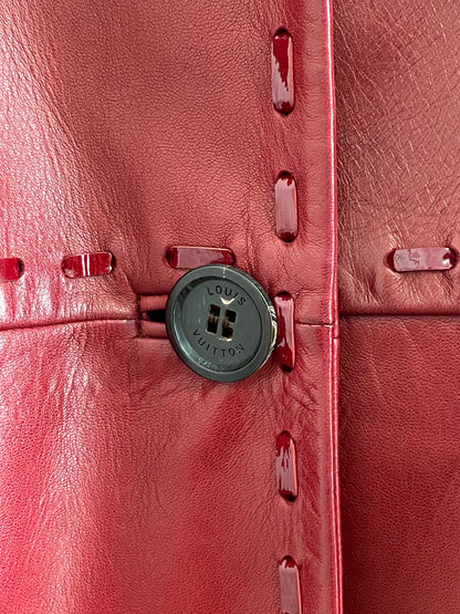 Manteau Louis Vuitton taille 40 en cuir bordeaux.