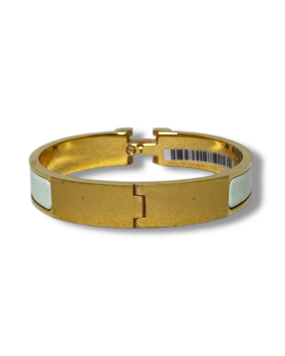 Bracelet Hermès Clic H doré et vert d'eau