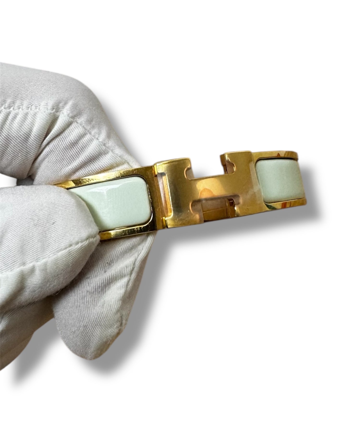 Bracelet Hermès Clic H doré et vert d'eau