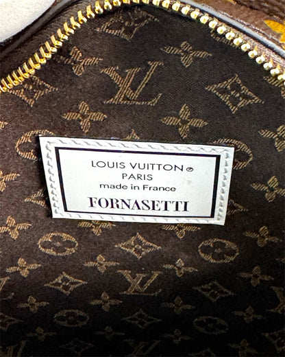 Pochette Tête Louis Vuitton x Fornasetti édition limitée