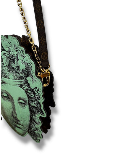 Pochette Tête Louis Vuitton x Fornasetti édition limitée