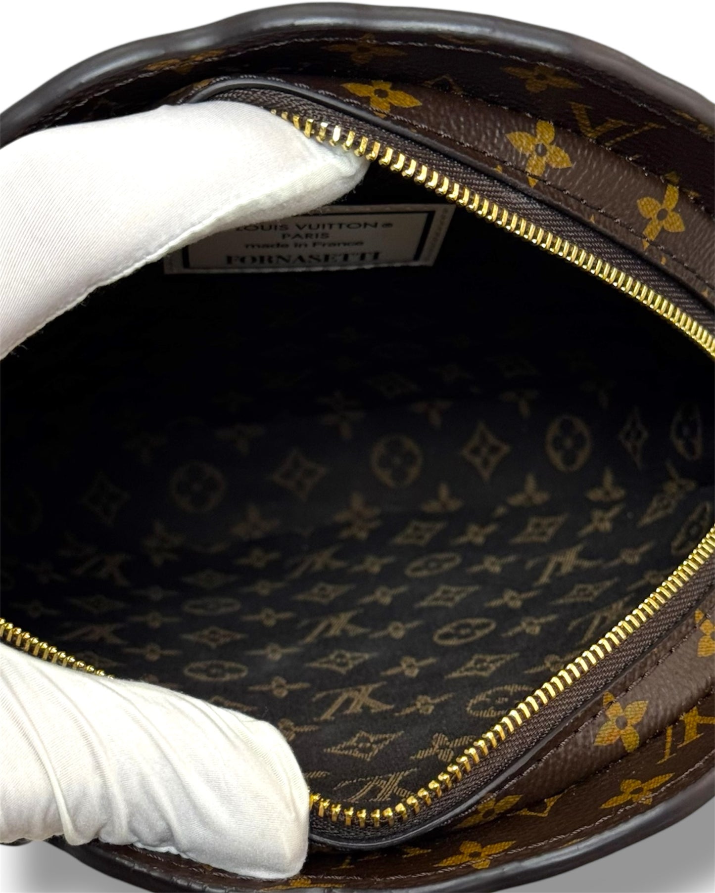 Pochette Tête Louis Vuitton x Fornasetti édition limitée