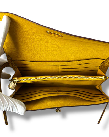 Portefeuille Hermès Kelly alligator jaune