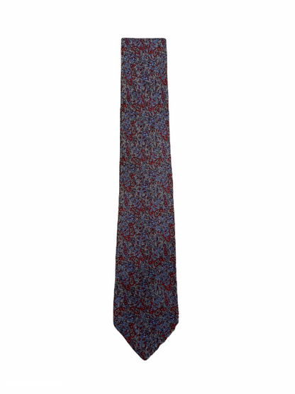 Cravate en soie Dior, fait main au motif fleuri, dans les tons bleu, gris et bordeaux.